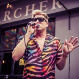 Andrew Derbyshire performing in Archer Street, Soho, for London Pride 2022